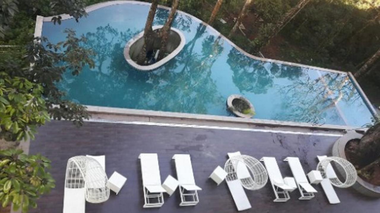 Elixir Hills Suites Resort And Spa Мунар Екстериор снимка